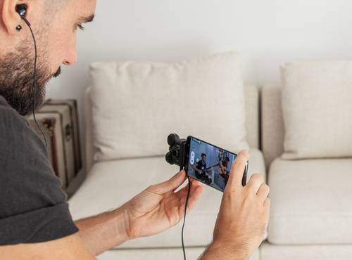 monitoring sound with headphones plugged into the Am7